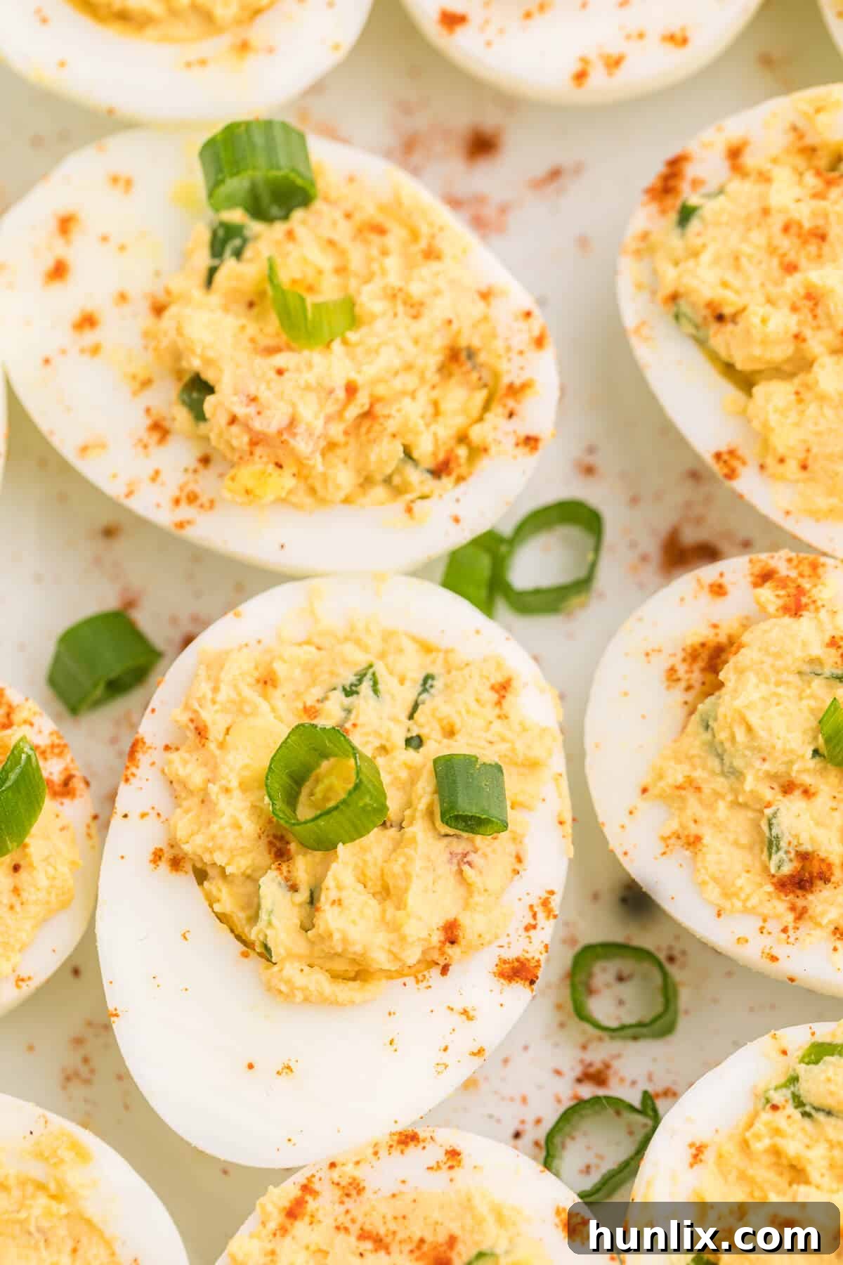 Fiesta Deviled Eggs 5 Salsa Deviled Eggs - a spicy kick to a popular appetizer recipe! This recipe is always gobbled up quickly.