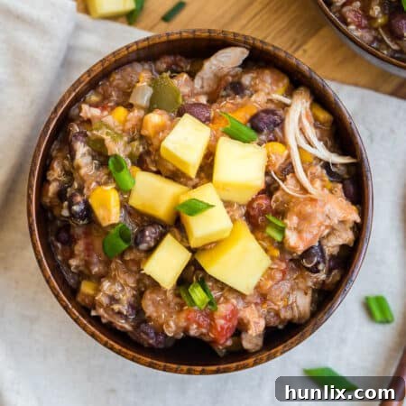A bowl of slow cooker chicken quinoa chili.