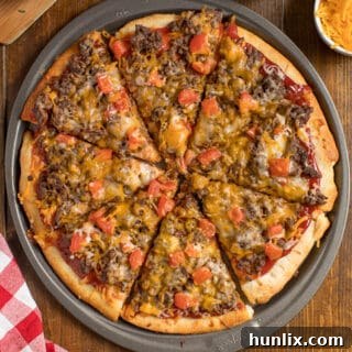 Cheeseburger Pizza - If you love cheeseburgers, you need to try this pizza! It tastes just like biting into a juicy, mouthwatering burger. Yum!