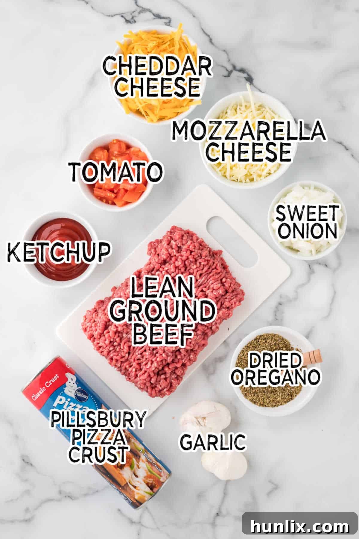 Ingredients to make cheeseburger pizza.
