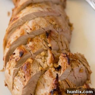 Honey Glazed Pork Tenderloin - Juicy & tender with a sweet honey garlic glaze with a hint of heat!