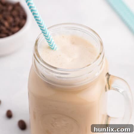 The recipe in a jar with a straw.