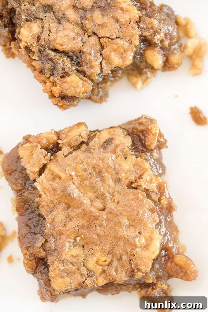Maple Syrup Bars - If you like butter tarts, then you will LOVE this dessert! Maple + butter tarts are combined to make these incredible, sweet and delicious squares. Oh Canada!