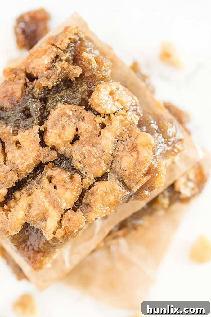 Maple Syrup Bars - If you like butter tarts, then you will LOVE this dessert! Maple + butter tarts are combined to make these incredible, sweet and delicious squares. Oh Canada!