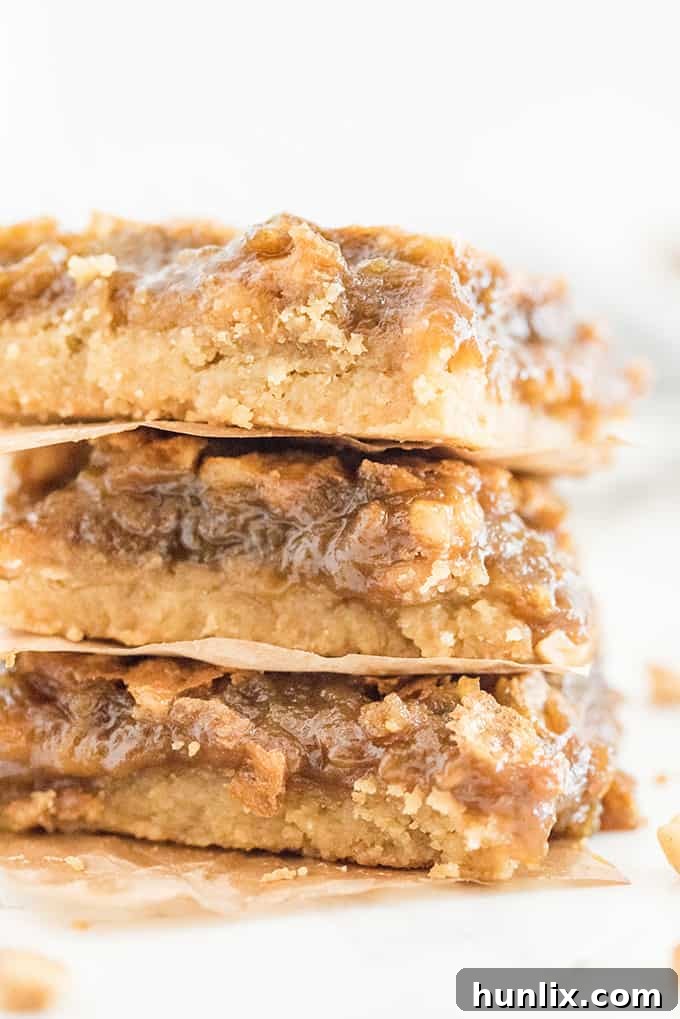 Maple Syrup Bars - If you like butter tarts, then you will LOVE this dessert! Maple + butter tarts are combined to make these incredible, sweet and delicious squares. Oh Canada!