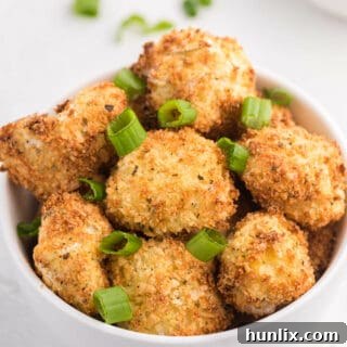A serving of crispy Air Fryer Cauliflower Bites in a bowl.