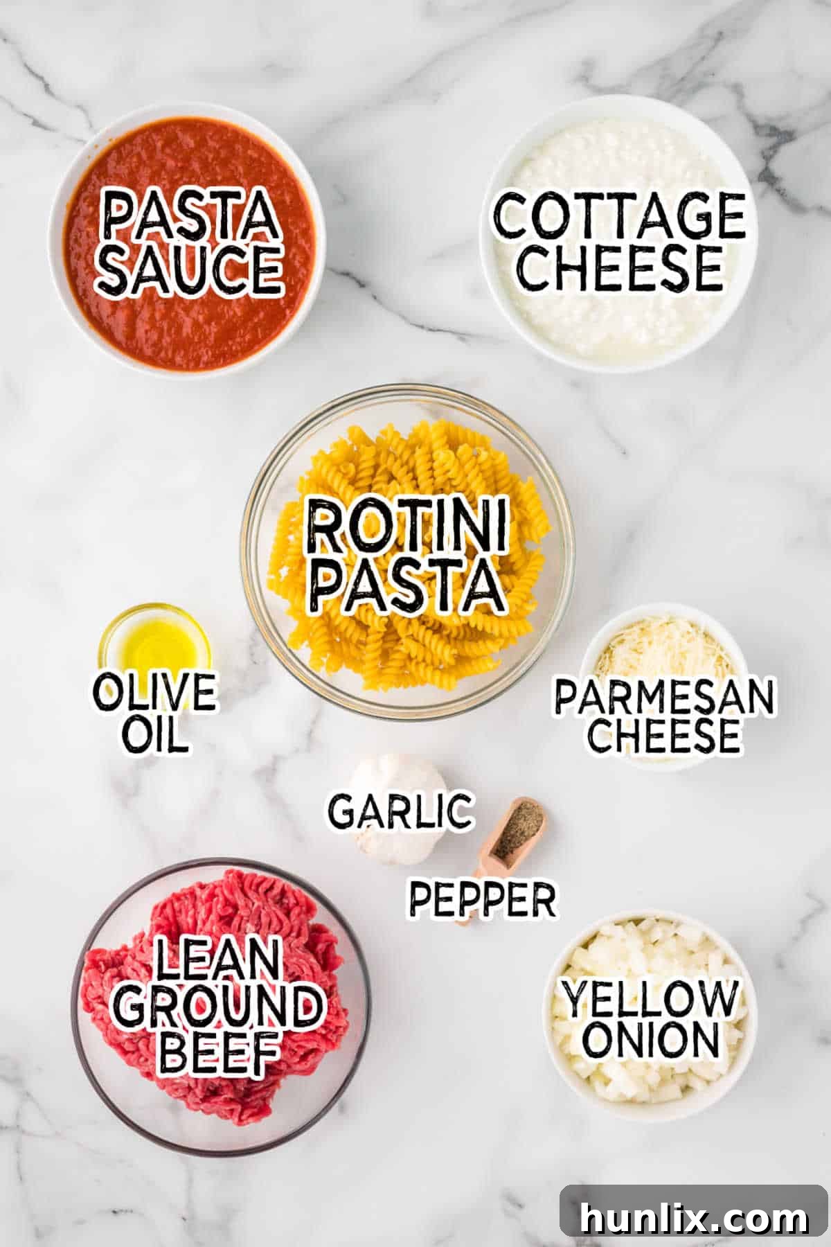 Ingredients on a white marble counter.