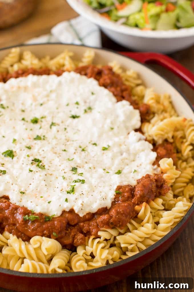 The recipe in a red pan.