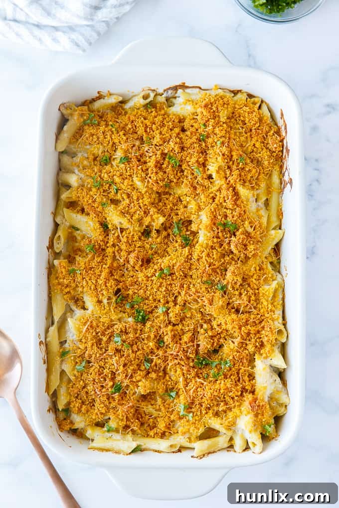 Tuna Noodle Casserole - creamy noodles topped with a crunchy cheesy topping. Chip dip is the secret ingredient!