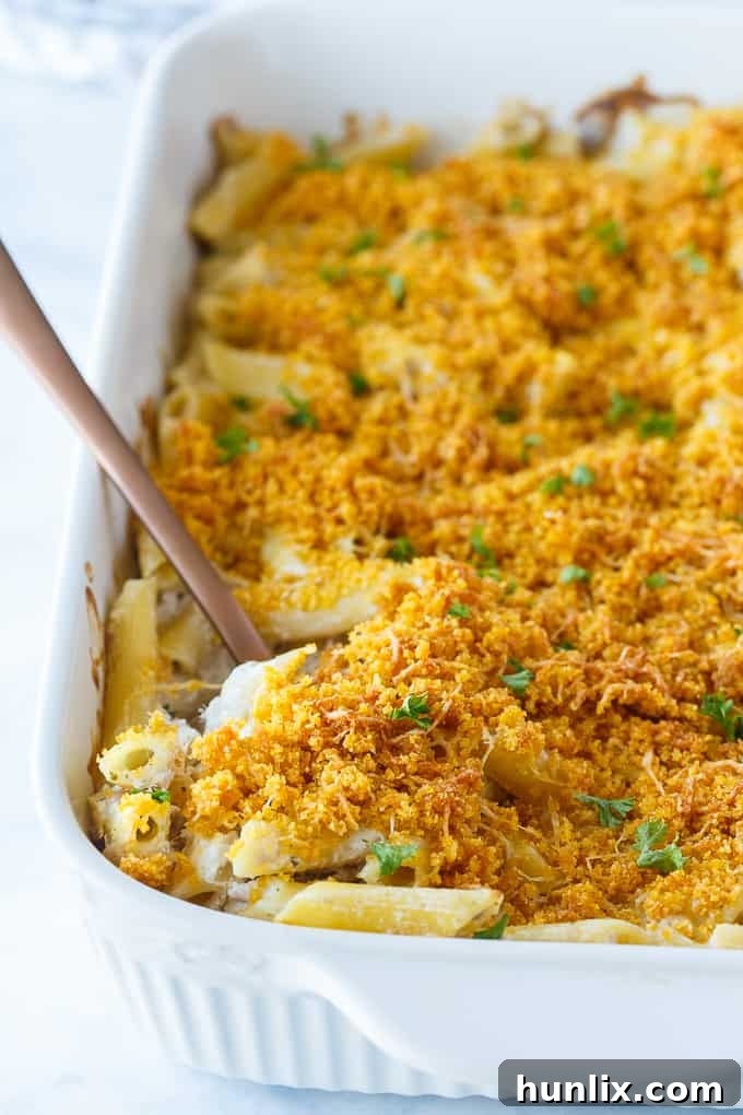 Tuna Noodle Casserole - creamy noodles topped with a crunchy cheesy topping. Chip dip is the secret ingredient!