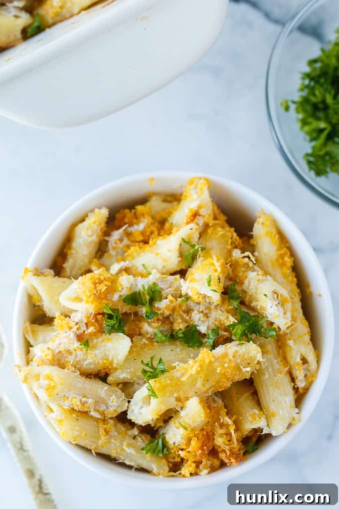 Tuna Noodle Casserole - creamy noodles topped with a crunchy cheesy topping. Chip dip is the secret ingredient!