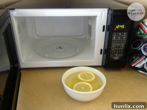 After Cleaning: A beautifully clean microwave interior, free from splatters and grime, showcasing the successful outcome of the natural and effortless cleaning method.