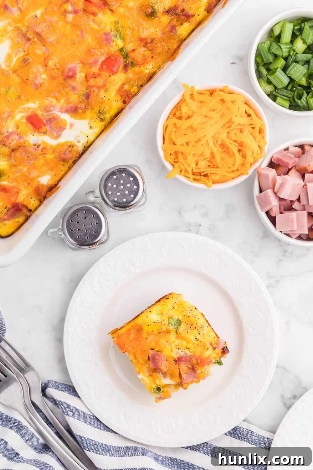 Golden Hash Brown Quiche 5 A slice of the recipe on a plate.