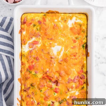 Golden Hash Brown Quiche 8 The recipe in a white pan.