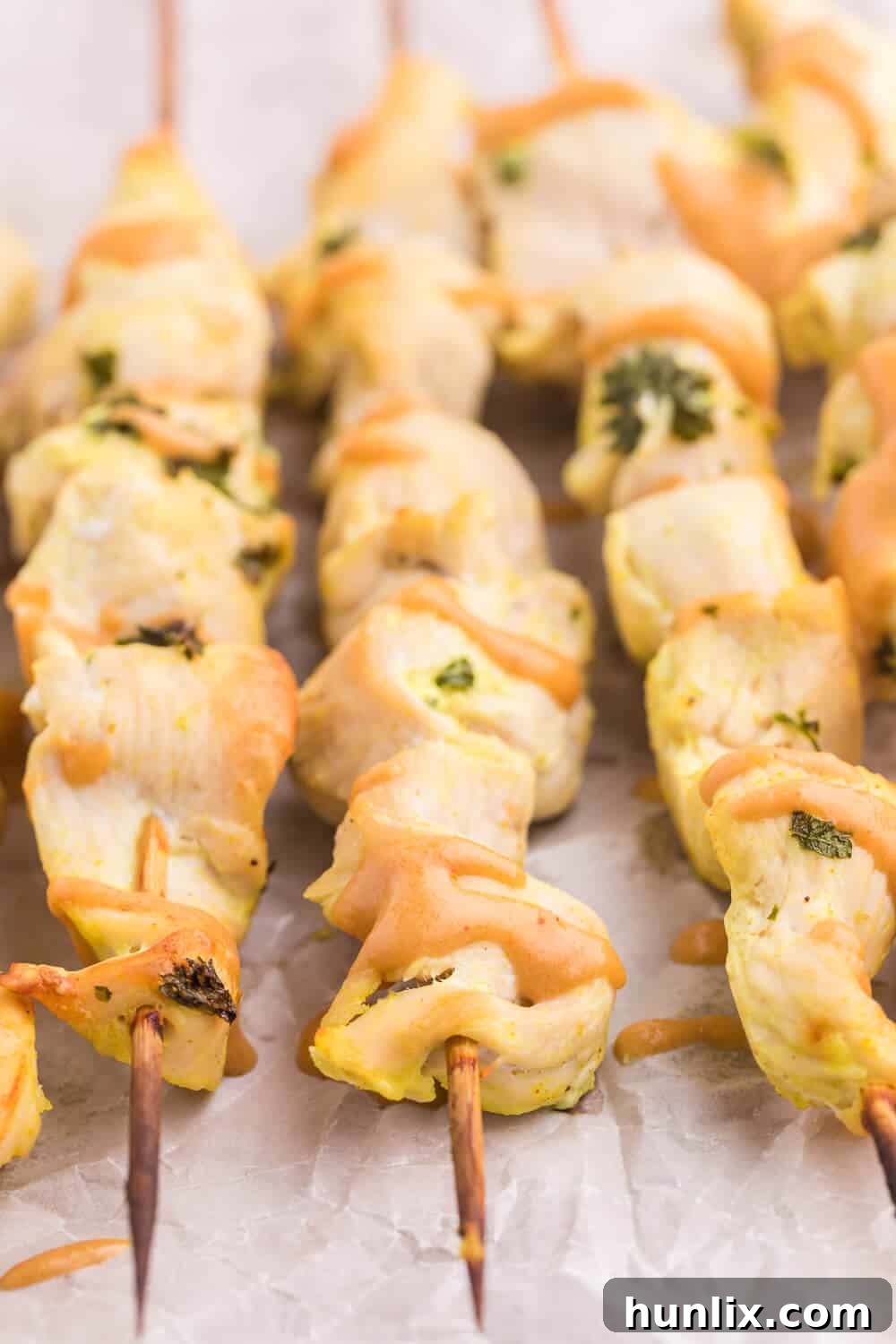 Tender Broiled Chicken Satay with Homemade Peanut Sauce - A quick and easy recipe for a healthy Asian-inspired dish.