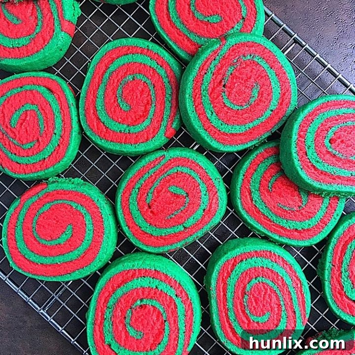 Christmas pinwheel cookies, visually stunning with red and green swirls, easy to make.