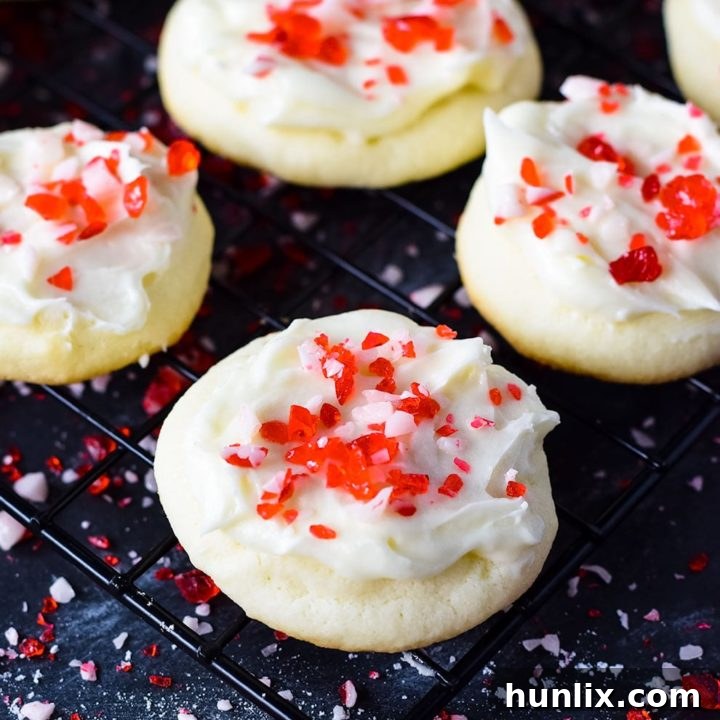 Soft and buttery peppermint meltaway cookies topped with white chocolate and candy cane sprinkles.