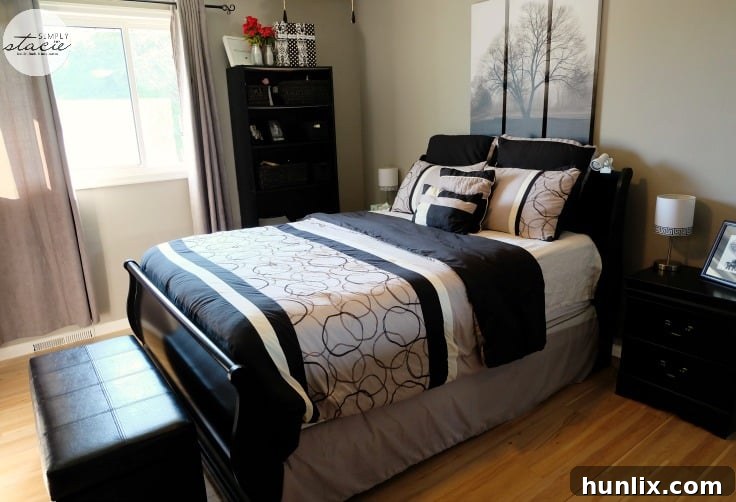 Master Bedroom Reimagined 4 Transformed master bedroom after renovation with new paint and flooring