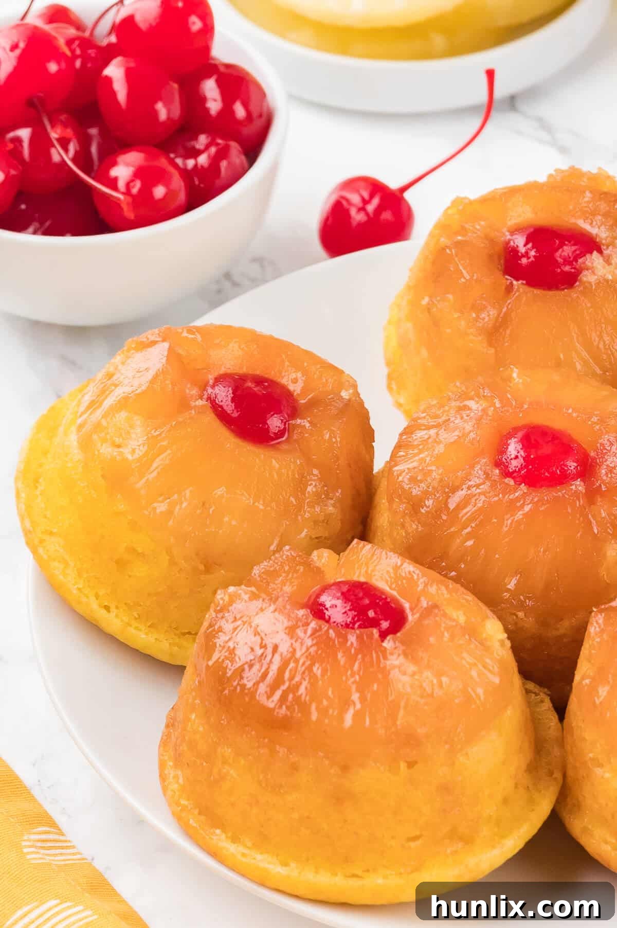 A group of cupcakes on a plate.