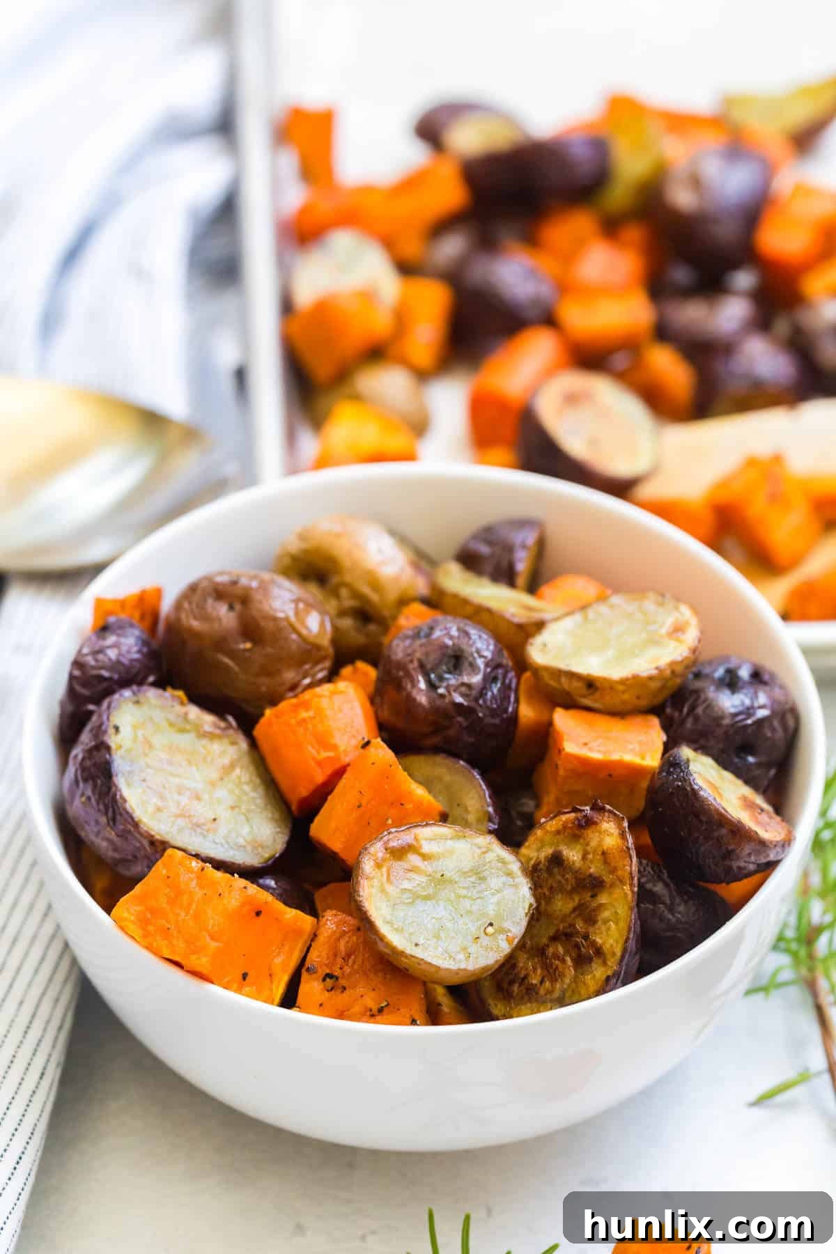 Roasted root vegetables in a bowl.