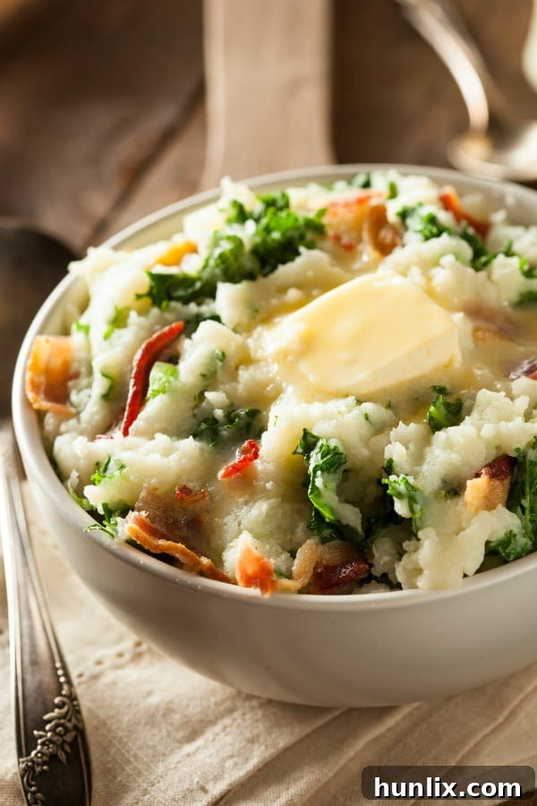 Ireland's Hearty Heritage: 14 Classic Dishes 3 Creamy Colcannon, an Irish dish made with mashed potatoes, kale or cabbage, and butter.