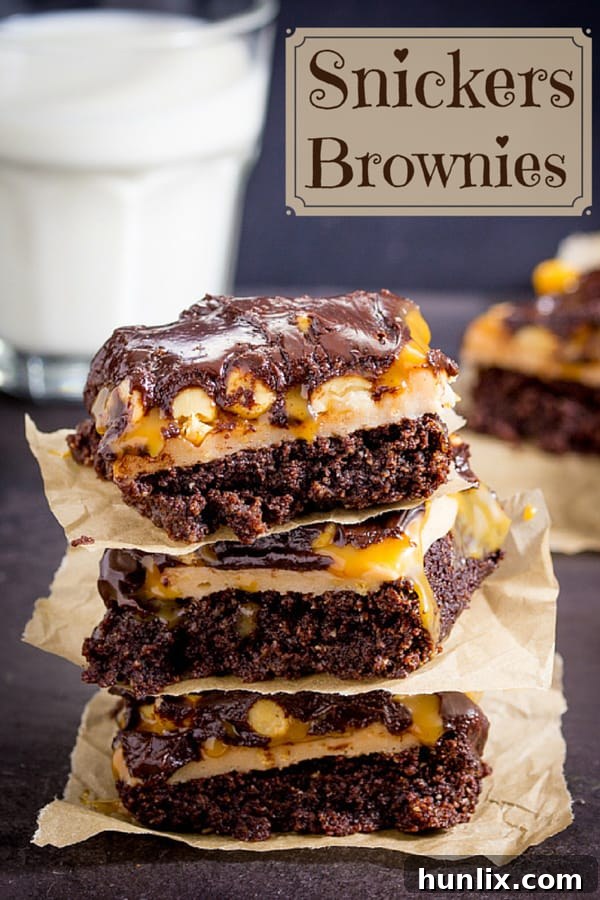 Decadent Snickers Stuffed Brownies 3 Snickers Brownies - Delicious AND gluten free! This decadent dessert recipe is a chocolate lover's dream with layers of nougat, peanuts, and caramel over a rich, moist brownie.