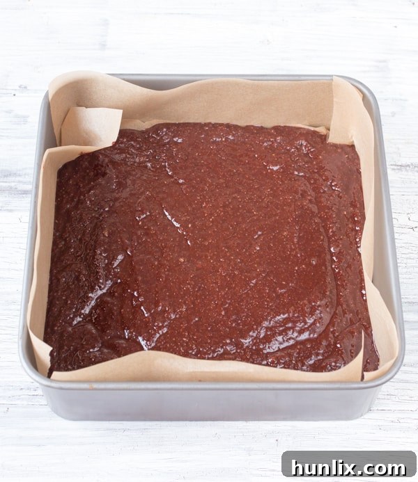 Decadent Snickers Stuffed Brownies 5 Snickers Brownies - rich and sweet with peanut nougat and salted caramel layers. You really don’t need much to satisfy that sweet tooth!