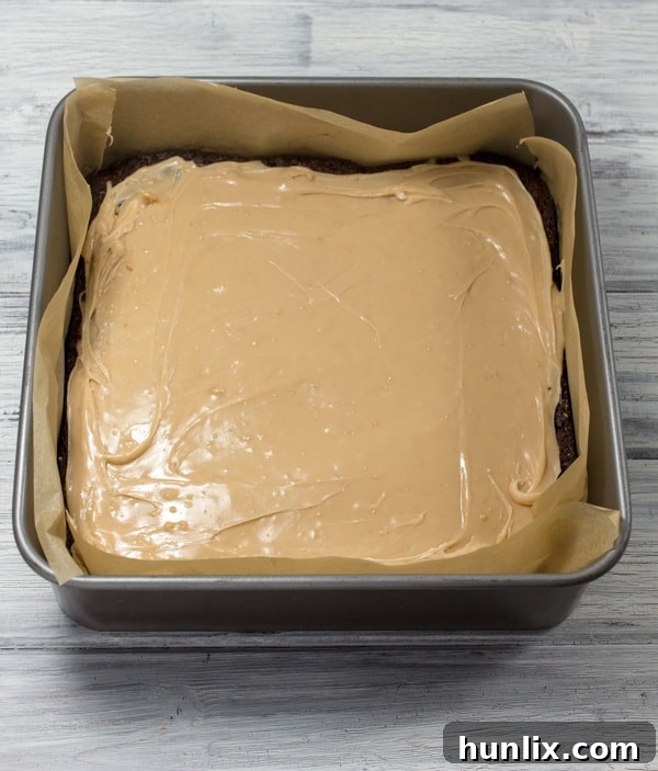 Decadent Snickers Stuffed Brownies 6 Snickers Brownies - rich and sweet with peanut nougat and salted caramel layers. You really don’t need much to satisfy that sweet tooth!