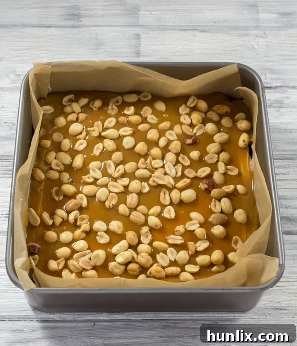 Decadent Snickers Stuffed Brownies 7 Snickers Brownies - rich and sweet with peanut nougat and salted caramel layers. You really don’t need much to satisfy that sweet tooth!