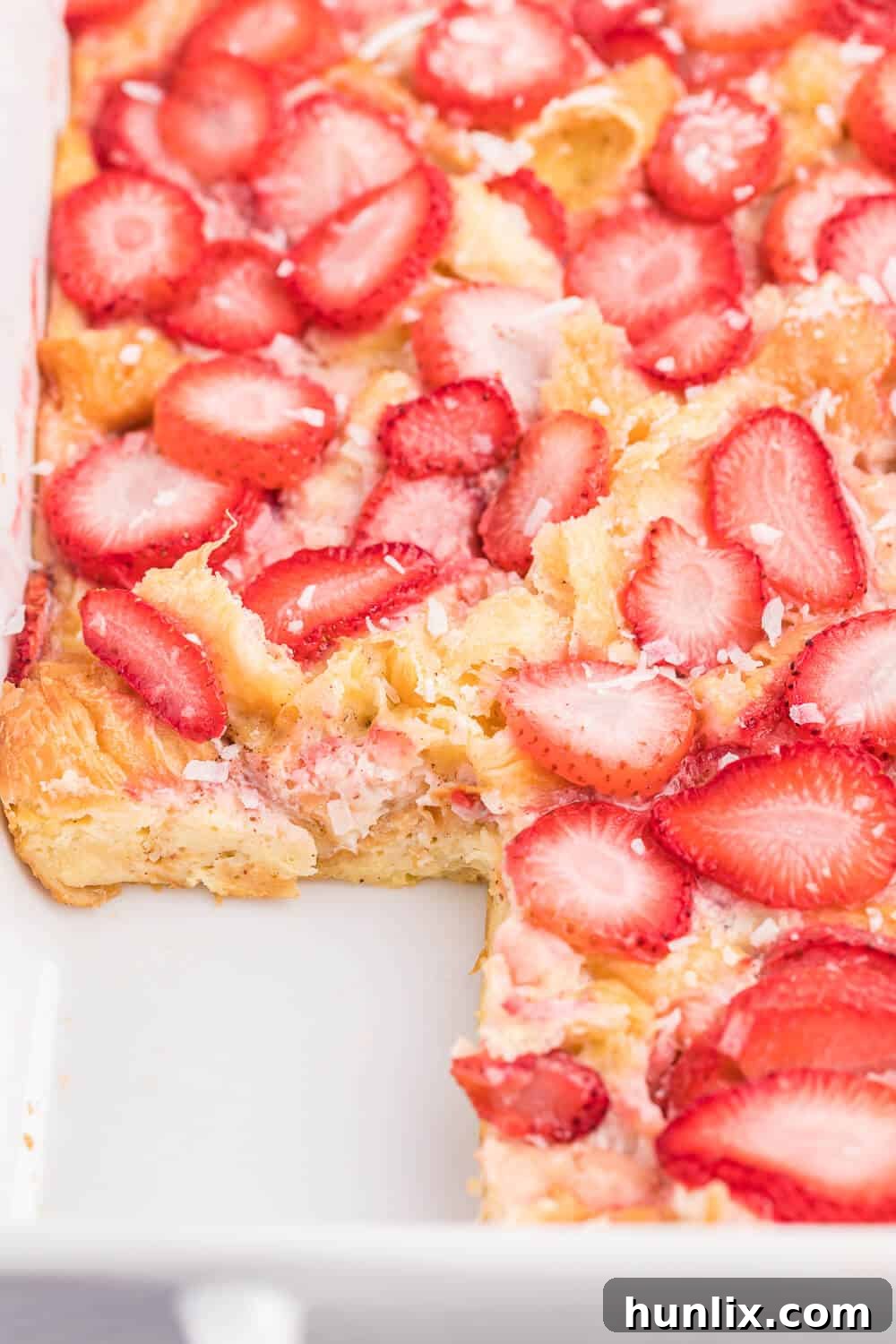 Strawberry & Coconut Breakfast Casserole - An easy-to-make overnight casserole for breakfast or brunch, featuring fresh strawberries and delightful coconut flavor.