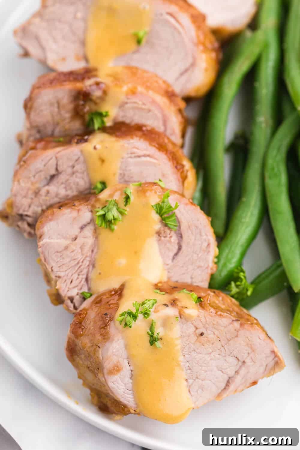 Brown Sugar Dijon Glazed Pork Tenderloin 8 An array of delicious side dishes served alongside Brown Sugar Dijon Pork Tenderloin, showcasing a complete holiday meal.