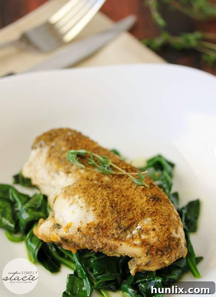 Close-up of Chicken Posole with Wilted Spinach, highlighting the vibrant colors and textures.