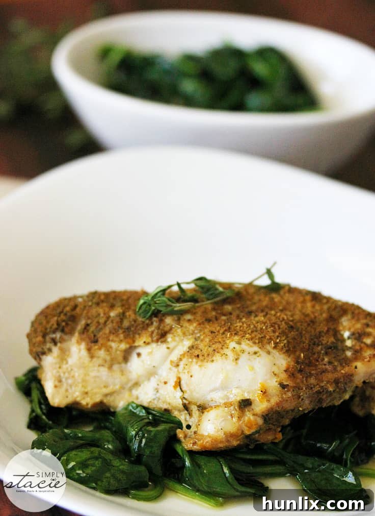 Plated Chicken Posole with Wilted Spinach, showcasing the perfect presentation for a healthy dinner.