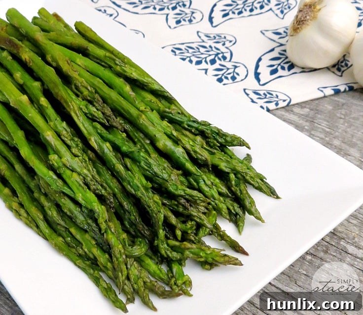 Oven Roasted Asparagus - The best way to make asparagus in the oven every time! Get the crispiest roasted asparagus for the perfect side dish.
