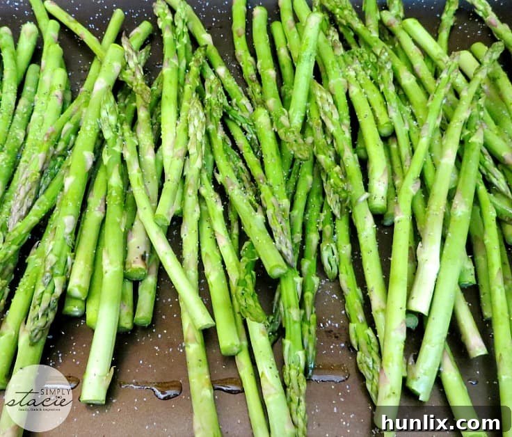 Oven Roasted Asparagus - The best way to make asparagus in the oven every time! Get the crispiest roasted asparagus for the perfect side dish.