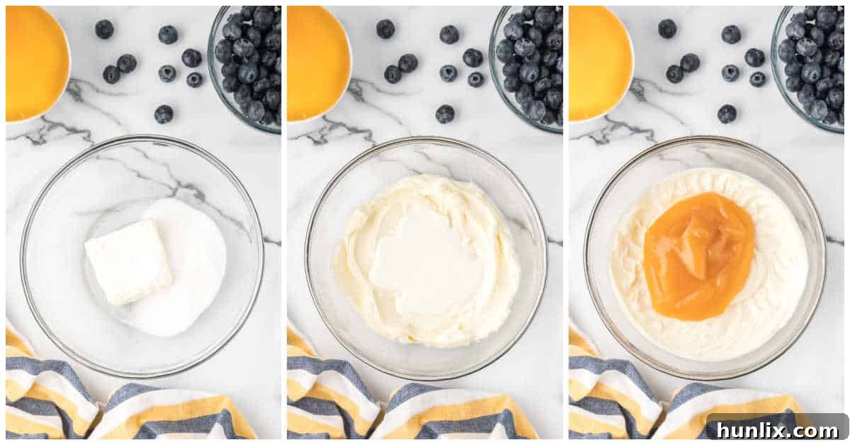 Lemon cream cheese filling being mixed in a bowl.