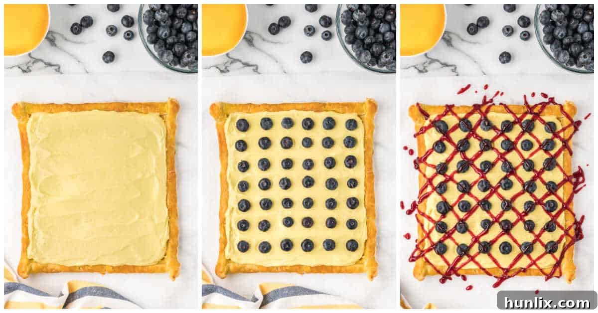 Finished blueberry lemon tart with cream cheese filling and berries, ready for serving.