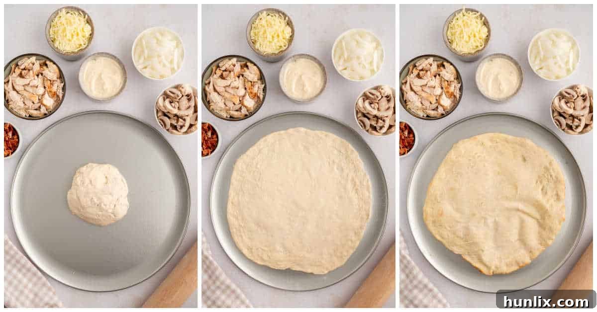 The initial stages of pizza preparation, showing pizza dough spread on a pan, with Alfredo sauce being spread, and various toppings like chicken, bacon, mushrooms, and onions arranged beside it.