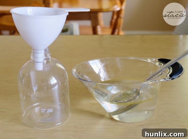 Mixing Ingredients for Homemade Essential Oil Room Spray for Freshness