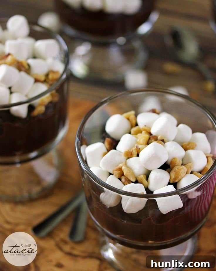 Decadent Rocky Road Delight 2 Rocky Road Pudding - Indulge in this decadent chocolate dessert made with creamy homemade chocolate pudding and topped with marshmallows and walnuts!