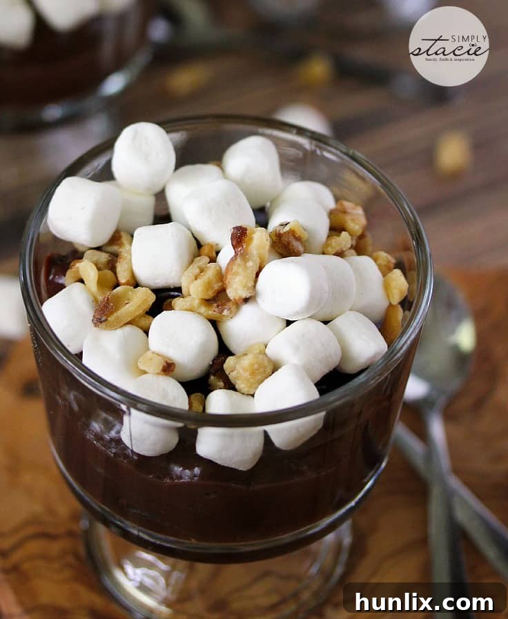 Decadent Rocky Road Delight 3 Rocky Road Pudding - Indulge in this decadent chocolate dessert made with creamy homemade chocolate pudding and topped with marshmallows and walnuts!