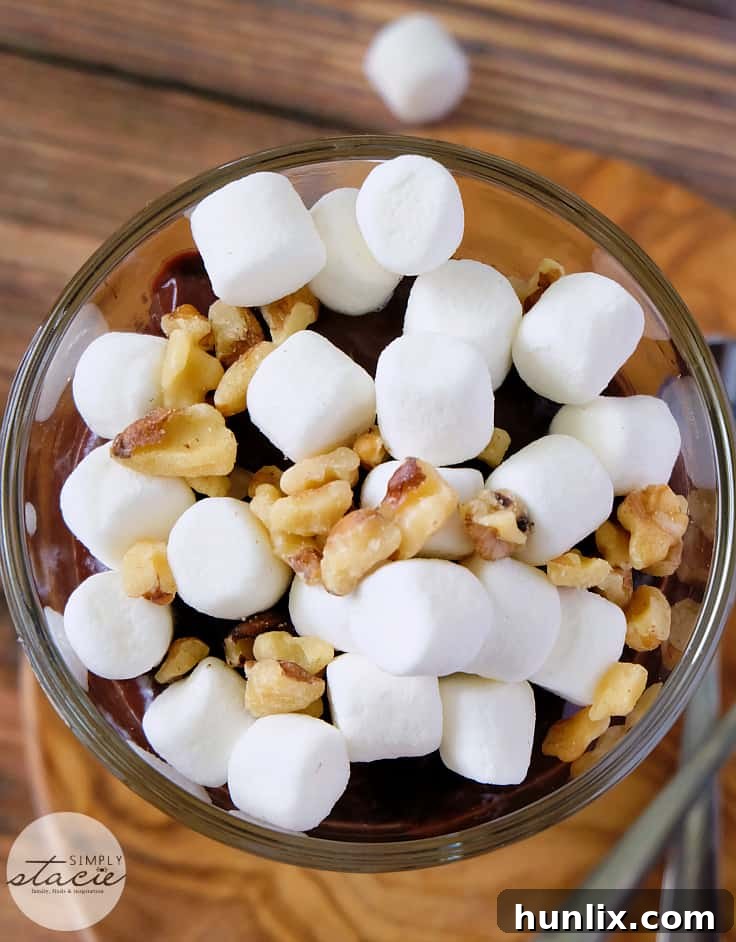 Decadent Rocky Road Delight 5 Rocky Road Pudding - Indulge in this decadent chocolate dessert made with creamy homemade chocolate pudding and topped with marshmallows and walnuts!
