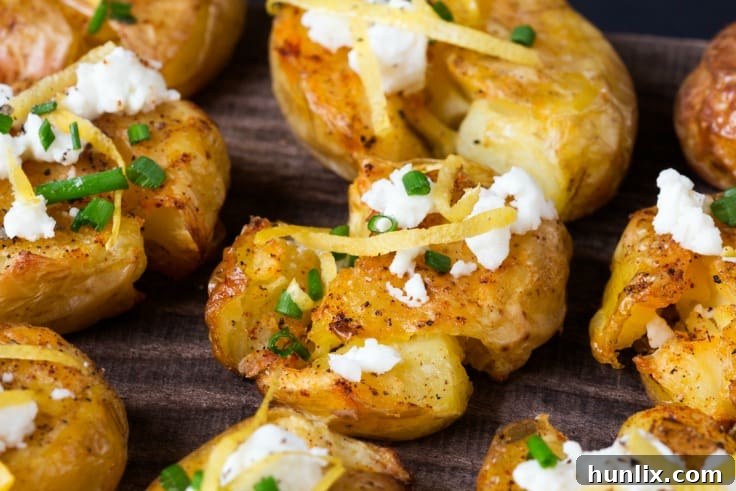 Mediterranean Smashed Potatoes with Lemon, Garlic and Feta 2 Crispy Smashed Potatoes with Lemon, Garlic, and Feta — golden edges and fluffy centers, perfect for any meal.