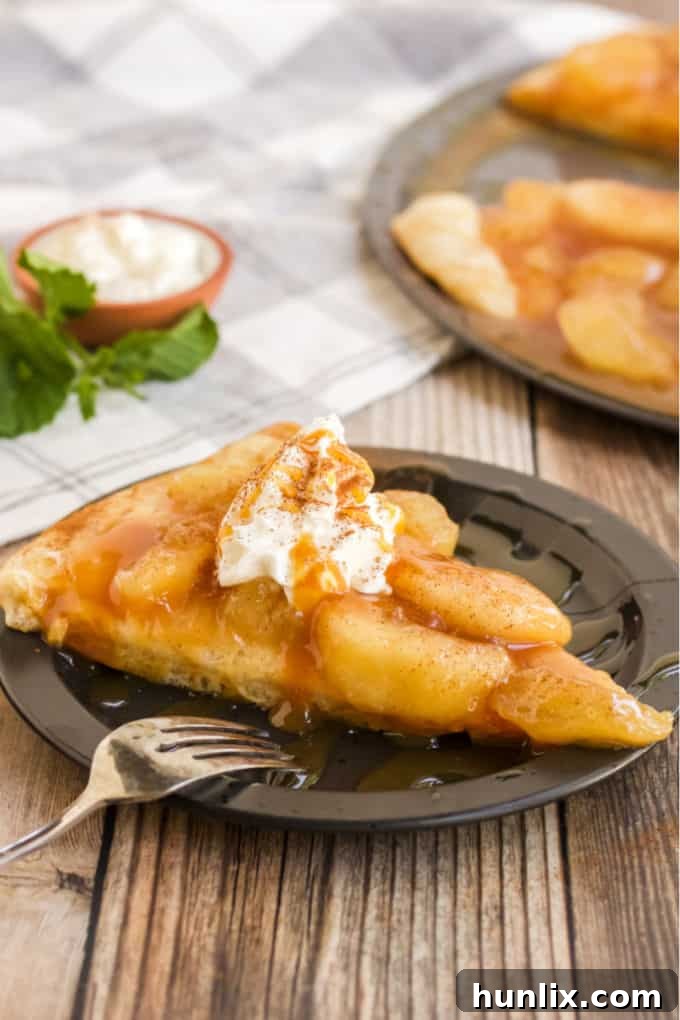 Caramel Apple Pizza - The PERFECT fall dessert pizza! Sweet cinnamon apple pie filling with rich caramel covering a basic pizza crust for the taste of pie without the mess and wait.