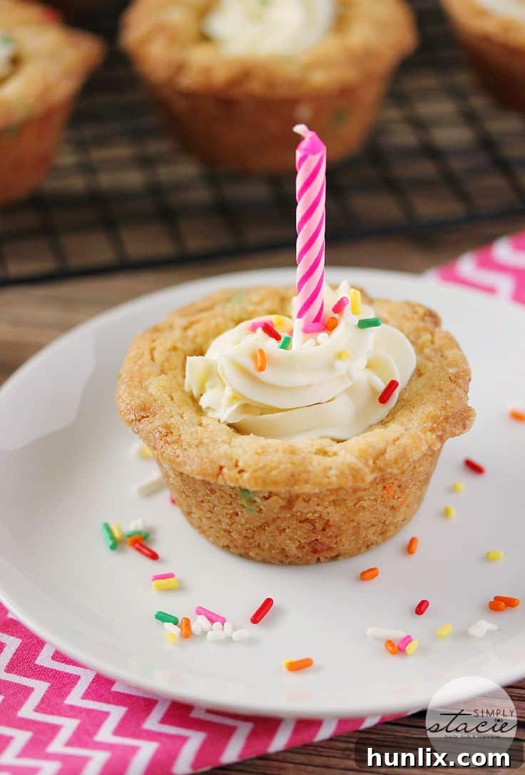 Birthday Cookie Cups - Your new birthday party staple! These bite-size cookie cups are filled with cream cheese frosting and bursting with sprinkles.