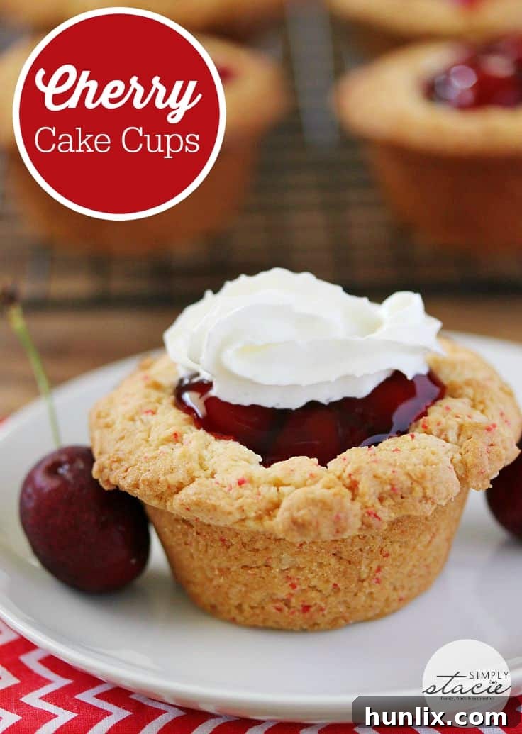 A close-up view of a Cherry Cake Cup with a generous scoop of cherry pie filling, tempting the viewer with its vibrant colors and delicious texture.