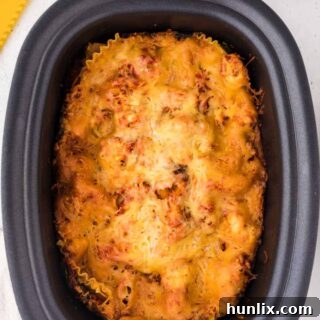 Cooked lasagna in a slow cooker.