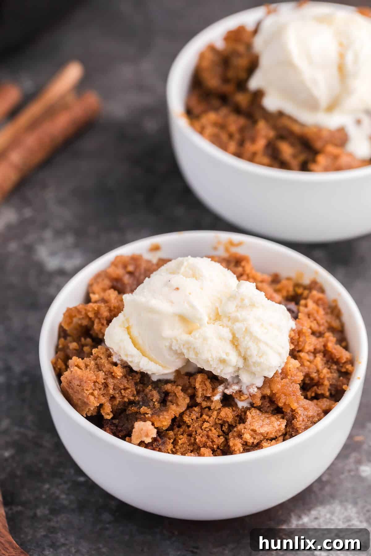 Slow Cooker Pumpkin Dump Cake - This is the easiest fall dessert! Your family will beg for this Crockpot dessert recipe made with boxed cake mix all year long.