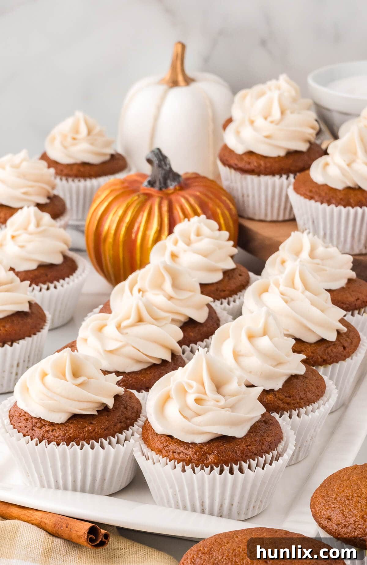 Cupcakes on a white platter.