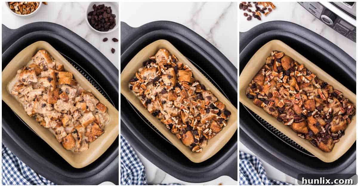 The slow cooker, with a baking dish containing cinnamon raisin bread pudding inside, during the final stages of cooking, uncovered for browning.